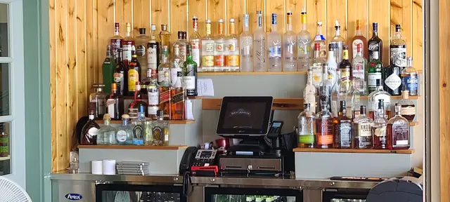 The oyster bar, its brick columns and the raw bar