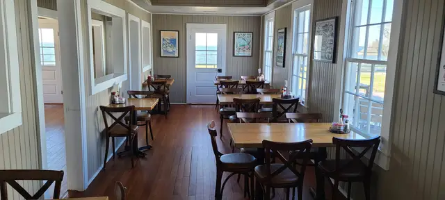 Cocktails and wine in the 1916 Sophie Wright Cottage